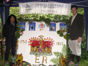 Mala Williams and Nigel Philpott with the 2012 Petal Fall Jubilee Collage