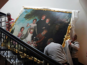 Painting being re-hung in the Guildhall 2 small