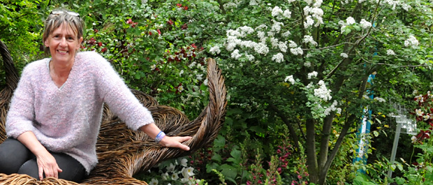 Sarah Eberle in garden banner